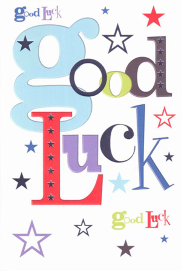 In this image, a modern good luck card lies against a pure white background, its design built around a bold, typographic celebration of the words GOOD LUCK. Each letter seems to have its own personality, arranged in a way that feels playful yet intentional, as though a designer has carefully mixed fonts like a florist layering textures and colours in a bouquet. The first G is oversized and baby-blue, rounded at the edges and immediately eye-catching, while the following letters shift between slender black strokes, spirited reds, mossy greens, and velvety purples. Together they create a rhythm along the centre of the card, neither too formal nor too casual, capturing that in-between space of sincere encouragement and light-hearted cheer. Around this central phrase, stars of varying sizes scatter outward, some sharp and bold, others soft and misty. Their palette ranges from inky navy and deep indigo to sky-blue, lilac, and pale lavender, echoing the feeling of an early evening sky above Bentley Priory when the first stars begin to appear. The card stock looks thick, smooth, and neatly cut, with a matte finish that would feel pleasant beneath your fingertips, reminiscent of the good quality greeting cards often chosen to accompany hand-tied flowers for local deliveries in Stanmore. There are no additional images, borders, or embellishments-just the confident typography and a flurry of coloured stars-so the message remains clear and uncluttered. The overall impression is of a tiny talisman of hope: a card you might slip beside a fresh bouquet for someone starting a new chapter, moving house within HA7, or stepping into a long-planned adventure, carrying with it a quiet chorus of you've got this.