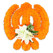 A vibrant, intricately crafted floral Khanda rests against a pristine white backdrop, its traditional form rendered entirely from hundreds of densely packed bright orange marigold blossoms. The marigolds are arranged with careful layering to create a plush, tactile surface that catches soft studio light and reads almost three-dimensional; shadows fall gently beneath the piece, suggesting a freestanding tribute on a tabletop or ceremonial plinth. The circular chakkar and the two crossed kirpans are clearly defined by the saturated orange mass, while at the very center a cluster of at least two fully open, creamy white lilies blooms-their petals unfurling with subtle cream-to-green veining and delicate yellow-green stamens visible in the throat. Sprigs of glossy green foliage tuck under the lilies, and airy sprays of tiny white filler flowers, likely gypsophila, weave through the design, adding contrast and a touch of softness to the bold orange. The arrangement radiates both celebration and reverence: the warm, slightly earthy scent of marigold balanced by the cool, clean perfume of lilies invites quiet reflection. As a Stanmore-made offering, this piece feels at home in local contexts-seen on community notice tables near Stanmore Broadway or as a respectful focal in gatherings at nearby Bentley Priory events. The overall impression is one of skilled floral craftsmanship: traditional materials and proportions, composed with sensitivity to light, texture, and the symbol's spiritual meaning, suitable for festivals, memorial tributes, or decorative displays within Sikh cultural observances.