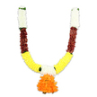 A carefully crafted, U-shaped artificial flower garland hangs against a clean white backdrop, its familiar festival silhouette rendered in plush, tactile materials that invite touch as much as sight. At the top of each arm a dense column of creamy white blooms-soft, chrysanthemum-like pom-poms-gives the garland a luminous crown; these pale clusters catch the studio light and suggest the gentle calm of early morning puja. Below the white, a band of deep reddish-brown forms a solid, textured transition: flattened, layered petals or dried-leaf imitations with a warm, earthen tone that anchors the composition and adds visual weight. As the garland curves downward the palette brightens into a wide, exuberant sweep of golden yellow, a mass of fluffy marigold-like spheres packed tightly to create the iconic celebratory U. Tiny touches of bright green appear intermittently at the junctions, like small leaf accents or ribbon bindings, giving the piece breathing space and a hint of organic contrast.
At the central lowest point a generous pendant of ruffled orange petals hangs as a focal flourish - voluminous, multi-layered, and glowing like a miniature sun. The overall texture reads soft and silky, slightly dense to the hand, while the artificial materials promise durability for repeated use at temples, doorways, and festival entrances. Emotionally, the garland radiates welcome and reverence: it feels equally suited to a Ganesh puja in a home off Stanmore High Street or a bright Diwali doorway on a chilly evening near Stanmore Common. The construction and colour choices speak of tradition, celebration, and careful craft, a decorative piece meant to last beyond a single season while keeping the same auspicious spirit as fresh flowers.