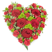 A richly detailed, heart-shaped floral design fills the image, set against a simple white background that makes every hue and petal stand out, as though just crafted for a Stanmore farewell gathering. The heart is composed primarily of deep red blooms, with several large roses placed across its surface like emotional anchors. Each rose displays velvety petals coiled inward, creating deep, shadowed centres that feel both romantic and reverent. Surrounding them, countless smaller red carnations are tightly clustered, their soft, frilled petals overlapping to form a plush, cushion-like bed of colour. This dense carpet of carnations adds luxurious texture and ensures that the heart looks full and abundant from edge to edge. Dotted throughout the red are vibrant lime-green button chrysanthemums, their small, perfectly rounded heads bringing lively contrast and breathing a touch of fresh energy into the arrangement. Outlining and threading between the blooms is a selection of variegated foliage, likely pittosporum, whose green leaves tipped with cream help define the heart's curves and add gentle movement. Near the pointed end at the bottom, a few fern-like fronds emerge gracefully, their delicate, feathery structure offering a final whisper of natural elegance. The overall effect is one of deep sympathy and enduring love, perfectly suited to accompany a service at a Stanmore church or crematorium, or to be delivered to a family home along the quiet residential streets near Stanmore Golf Club. This heart-shaped tribute, with its bold reds and bright greens, speaks of remembrance, gratitude, and the bonds that remain even after a loved one has gone.