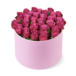 Stanmore's quiet elegance finds a perfect expression in this lush bouquet. Dozens of tightly gathered deep fuchsia roses form a round, velvety dome that sits inside a graceful pastel pink hat box. The petals tilt and curl in on themselves, each bloom a soft ellipse of colour, gradient from pale centers to jewel-toned edges. The box itself has a smooth, matte finish with a subtle, almost velvet texture that mirrors the petals' luxury, a restrained frame that lets the roses sing. Only a whisper of dark green foliage peeks between the heads, chosen to hold the form without stealing attention from the flagship blooms. The scene is lit with clean studio light and captured from a slightly elevated angle against a pure white background, so the bouquet reads as an emblem of romance and refined celebration.

In Stanmore, this arrangement speaks to anniversaries, grand birthdays, or gestures that want to say 'you are cherished' without shouting. The combination of the soft pink box and the jewel-like magenta blooms would grace a dining table, a coffee table in a Canons Park flat, or the foyer of a home along Stanmore Hill. Freshness is assured by our NW London floral team, with same-day delivery available across Stanmore and the surrounding streets. The design's generous form, with petals opening just enough to reveal their spiral charm, captures both luxury and warmth, making it a memorable gift for someone special or a refined centerpiece for a celebration.