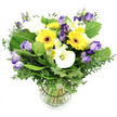 From a seasoned florist in Stanmore, this lush bouquet is elegantly arranged in a clear glass vase set against a pristine white backdrop that makes its cheerful colors glow. The arrangement blends bright yellow Gerbera daisies, each bloom a sunny disk with a bold dark center, with generous clusters of ruffled Lisianthus in lavender through to deep purple, some fully opened and others as delicate buds that add depth and movement. Interwoven are pristine white Calla lilies, their satin-shaped spathes lending sculptural grace. Scattered among them are white Alstroemeria, or Peruvian lilies, with subtle yellow and green streaks that catch the light and add fine texture. The foundation is a lush carpet of greenery: slender eucalyptus branches in silvery-green offering a soft aroma and a touch of archival grace, plus broad green leaves that provide fullness and contrast with the vivid blooms. The stems are clearly visible through the water in the transparent vase, and a subtle black tie around the stems inside the vase keeps everything neatly structured. The bouquet radiates freshness, warmth, and refined elegance, making it an ideal gift for birthdays, anniversaries, or heartfelt wishes. In Stanmore, this bright arrangement is perfect for brightening a home or office on Canons Park Road, Stanmore Hill, or the High Street, and is available for reliable same-day delivery across the area through Flower Delivery Stanmore. It brings a local touch to your space, a little sun on a grey day.