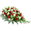 A beautifully composed funeral flower spray is shown on a clear white background, its colours and form standing out with quiet elegance. The design stretches horizontally, with a lush, rounded concentration of blooms on the left that gradually tapers into a slender, trailing finish on the right, giving the arrangement a gentle sense of direction, as if it were leading the eye through a final, graceful farewell. Deep red roses, rich and velvety, are scattered throughout, their tightly layered petals forming full, dignified heads that express deep affection, admiration, and respect for the departed. Interspersed among these roses are numerous white carnations, their ruffled, fluffy petals softening the overall look and symbolising purity, remembrance, and a wish for peaceful rest. These blooms rest upon a bed of generous greenery. Broad, dark green leaves lend the piece weight and structure, while stems of silvery-green eucalyptus thread through the flowers, adding cool, muted tones and a faint suggestion of fresh aroma. At the far right, delicate strands of trailing foliage, likely ruscus or similar, extend outward in feather-light arcs, softening the edges and giving the spray a naturally cascading feel. The mood of the arrangement is both formal and compassionate, an appropriate choice for a casket spray or memorial tribute at a service in Stanmore, perhaps near Canons Park or along the quieter residential streets. Crafted with thoughtful care, it reflects the skill of local florists who understand how to translate sympathy and remembrance into flowers, offering families a comforting, visual expression of their love and farewell.