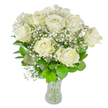 A graceful, museum-like bouquet of roughly a dozen creamy white roses clustered with clouds of baby's breath (Gypsophila) sits in a simple clear glass vase against a pristine white backdrop. Each rose shows its own stage of opening - some petals unfurled like velvet bowls, others still gently curled at the centre - the soft cream tones catching diffused light so the blooms seem to glow. Tiny white sprays of gypsophila weave through and around the roses, creating a lace-like halo that lightens the composition and lends an airy, almost snowy texture. Glossy green foliage, from deep emerald outer leaves to fresher lime-hued inner sprigs, frames the flowers and adds dimensional contrast, while the visible trimmed stems and water level in the vase reassure the viewer of freshness and careful handling. The gentle, barely-there scent of the roses is suggested rather than proclaimed, a tender, green whisper that fits a quiet morning or a reflective evening. This arrangement reads as timeless and composed - appropriate for weddings, intimate anniversaries, or moments of remembrance where restraint and purity are desired. As a florist in Stanmore I picture this arrangement on a windowsill near Canons Park or as a calm centrepiece for a reception by Stanmore Common: it brings light without shouting, a poised statement of simplicity and care. The white background and clear glass focus every attention on texture, shape and the soft interplay of ivory and green, making the bouquet feel at once formal and warmly domestic, a gentle offering of comfort, celebration, and enduring grace.