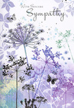 This sympathy card carries the soft, measured tone of a quiet evening in Stanmore, translated into watercolour and fine linework. Across the front, airy silhouettes of wild umbelliferous flowers sway gently upward, their slender stems bending with a natural, unforced curve. The small, clustered flower heads sit like tiny crowns at the top of each stem, depicted in cool, soothing shades of lavender, indigo, and soft blue, with subtle touches of muted sage that suggest light foliage. The artist has allowed the colours to fade gradually at the edges, so each blossom appears almost weightless, as though it could dissolve back into the sky. Behind the flowers, a calm wash of pale purple and grey-green merges without sharp boundaries, calling to mind the soft outlines of trees and fields seen from a distance, perhaps recalling the views near Stanmore Golf Course or the fringe of Stanmore Country Park. Among the blooms, butterflies drift in gentle arcs, their wings stained with the faintest hues of lilac and blue, semi-transparent and serene. They do not dominate the scene; instead, they act as quiet symbols of presence and transformation, hovering above the delicate stems. The entire composition is bathed in diffuse light, giving the impression of a peaceful, overcast day that encourages stillness and introspection. Paired with sympathy flowers or a funeral wreath delivered to a family home or local chapel in Stanmore, this card offers a respectfully understated way to share condolences, wrapping your message in the calming language of nature and a palette designed to soothe the heart rather than overwhelm it.