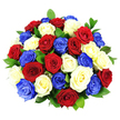 The image shows a tightly gathered bouquet of roses in an eye-catching patriotic palette, with deep crimson red, clean white, and vibrant cobalt blue blooms massed together into a smooth, dome-shaped arrangement. Approximately three dozen roses are visible, each one fully open so that its velvety petals form layered spirals, some gently curling at the edges to add softness and movement. The colours are distributed evenly across the bouquet, giving a sense of balance and harmony: the red roses bring warmth and intensity, the white roses offer a calm, bright contrast, and the blue roses provide a bold, ceremonial note that would suit civic or family celebrations in Stanmore. Dark green, slightly glossy leaves peek out between the blossoms, offering touches of natural texture and helping to define the rounded contour of the bouquet without detracting from the strong tricolour theme. The background is stark white and uncluttered, creating the impression that the bouquet is almost floating, with bright, even lighting enhancing the saturation of the hues and the freshness of the petals. There are no visible containers, ribbons, or additional decorations; the emphasis is entirely on the roses themselves, as if they have just been hand-tied by a local florist and are ready to be delivered to a home near Old Church Lane or a gathering by Canons Park. The arrangement conveys pride, unity, and celebration, making it perfect for marking national holidays, remembrance events, or any special occasion where a meaningful, visually striking floral gesture is desired in the Stanmore area.